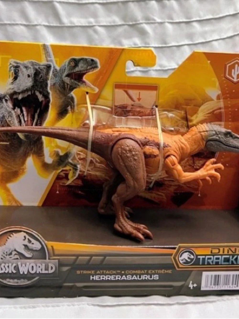 Mattel- Jurassic World Strike Attack Herrerasaurus Figure-Dino Trackers
